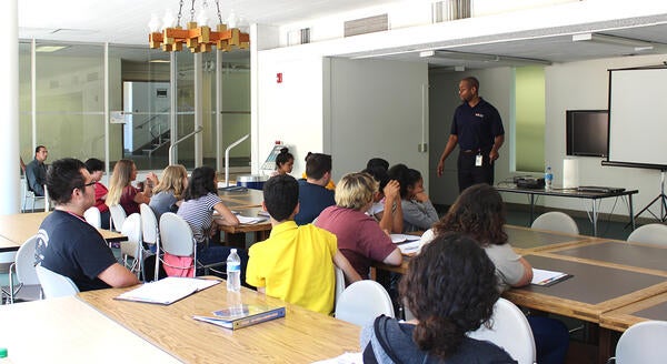 Dr. Davis speaking to students